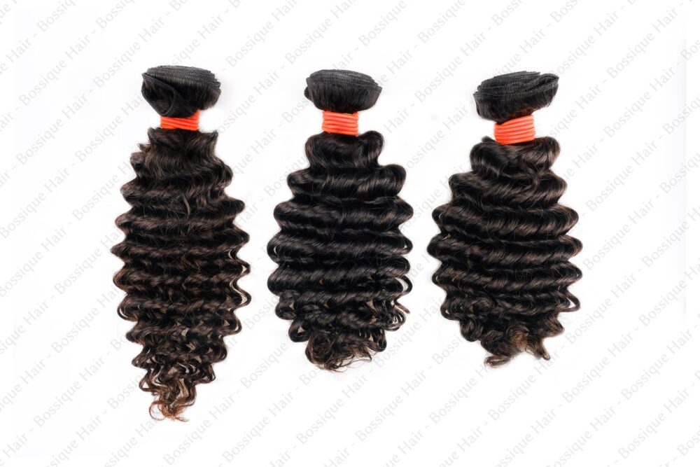 Three Orange Line raw human hair bundles in deep wave texture laid side by side.