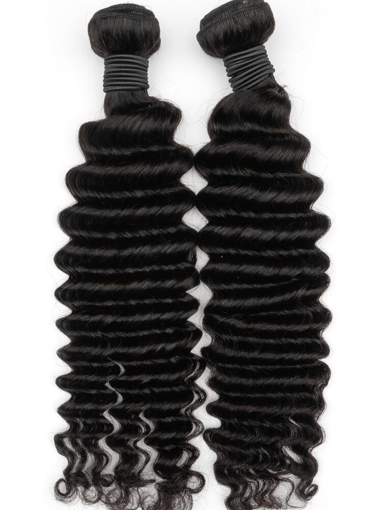 Two bundles of deep wave hair extensions laid out.