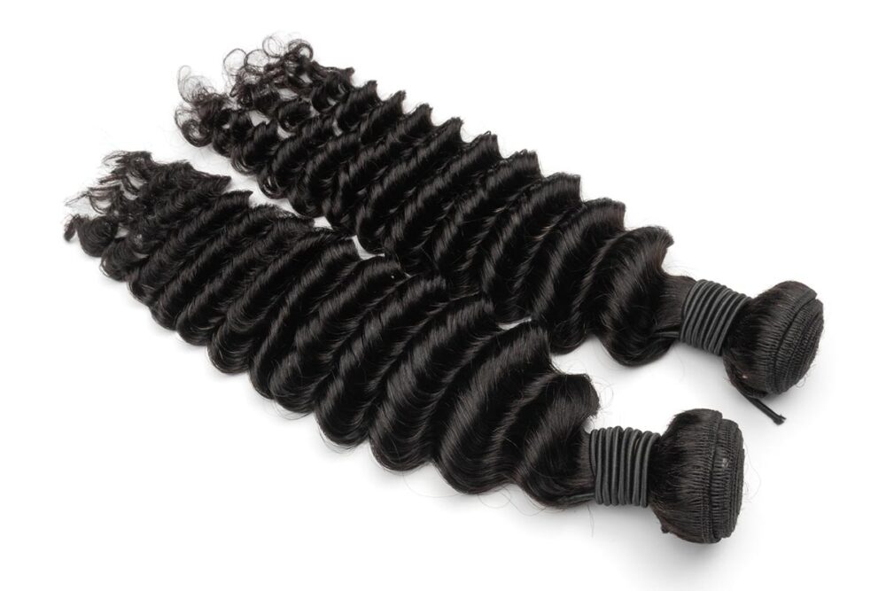 Pair of deep wave human hair bundles side by side.