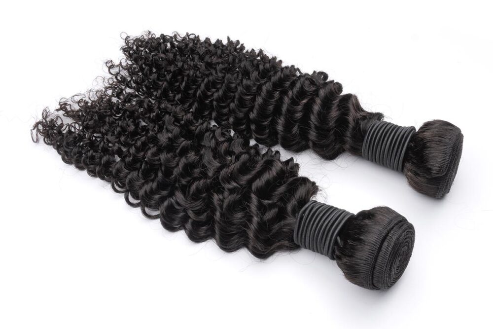 Two kinky curly hair bundles side by side.
