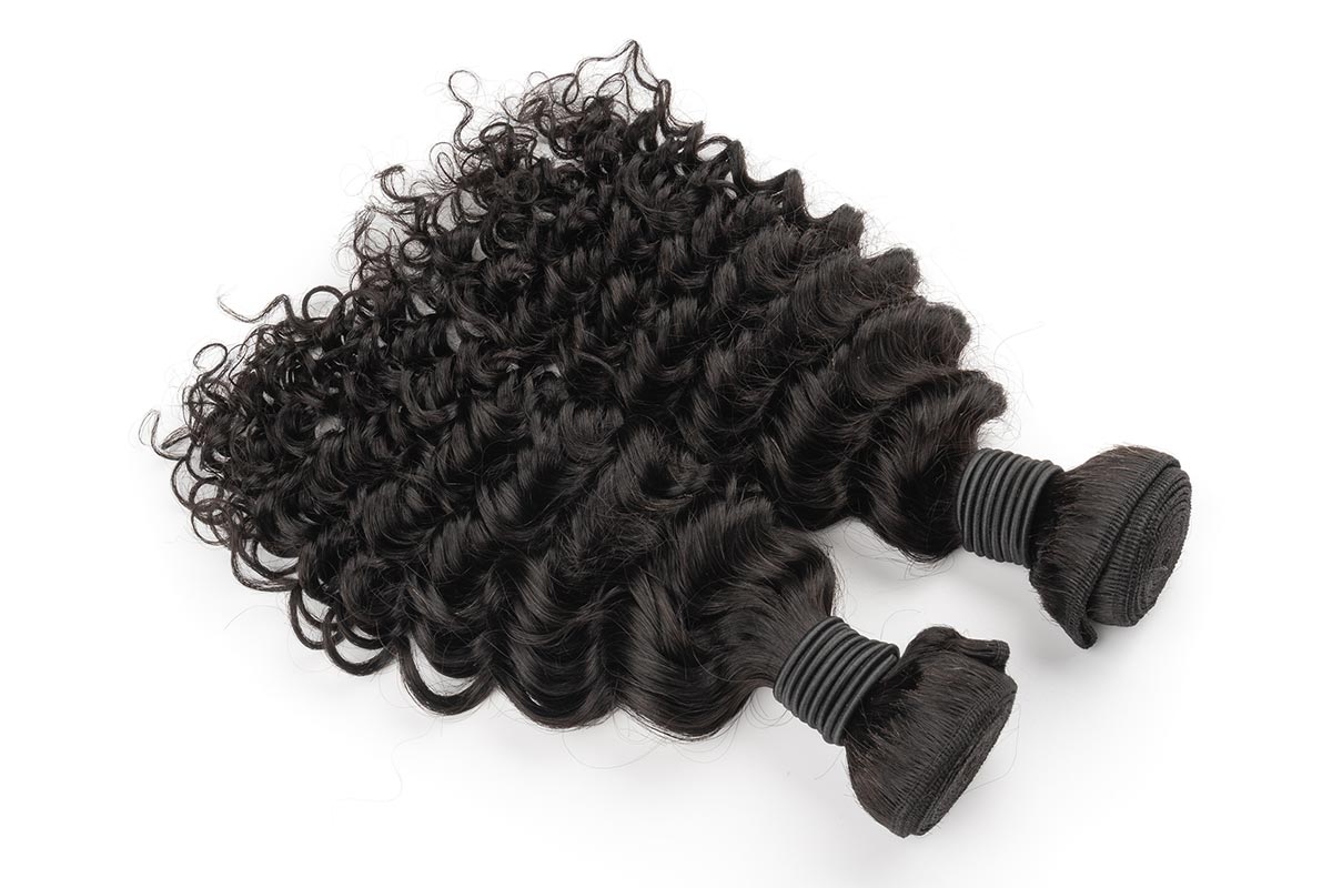 Two bundles of Black Line French Curly Hair extensions.