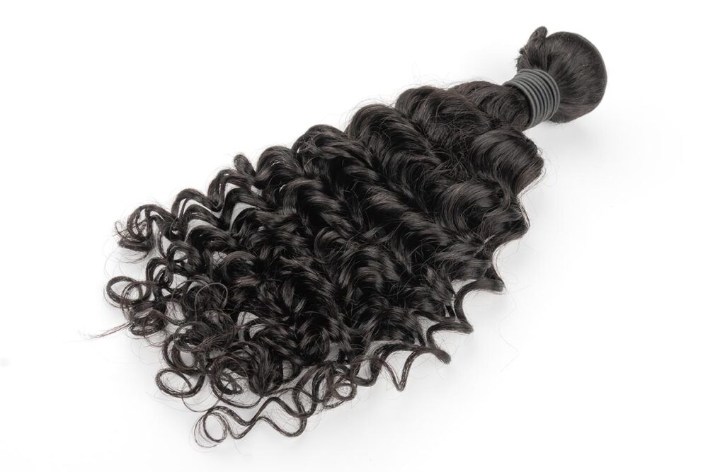 Soft curls of a single French Curly Hair bundle.