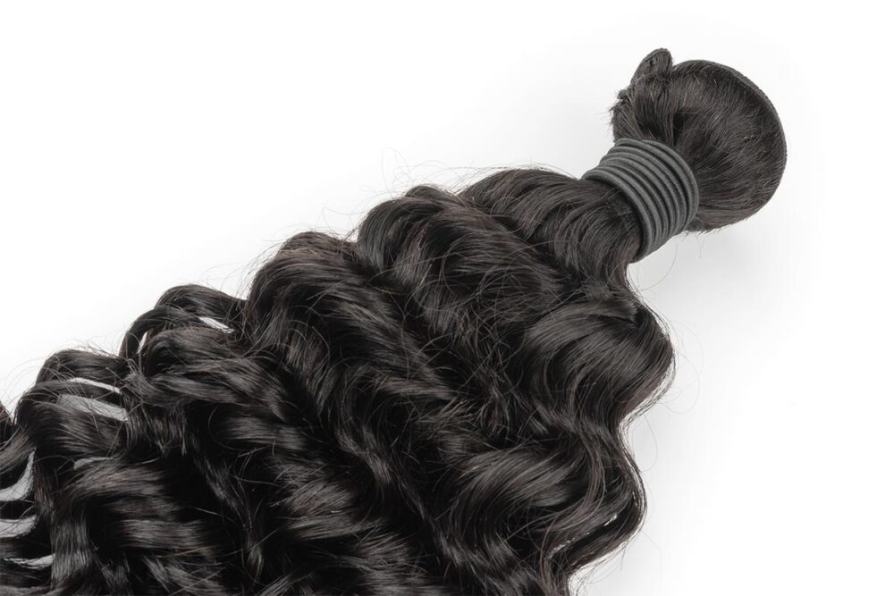 Detailed curl texture of French Curly Hair extension.