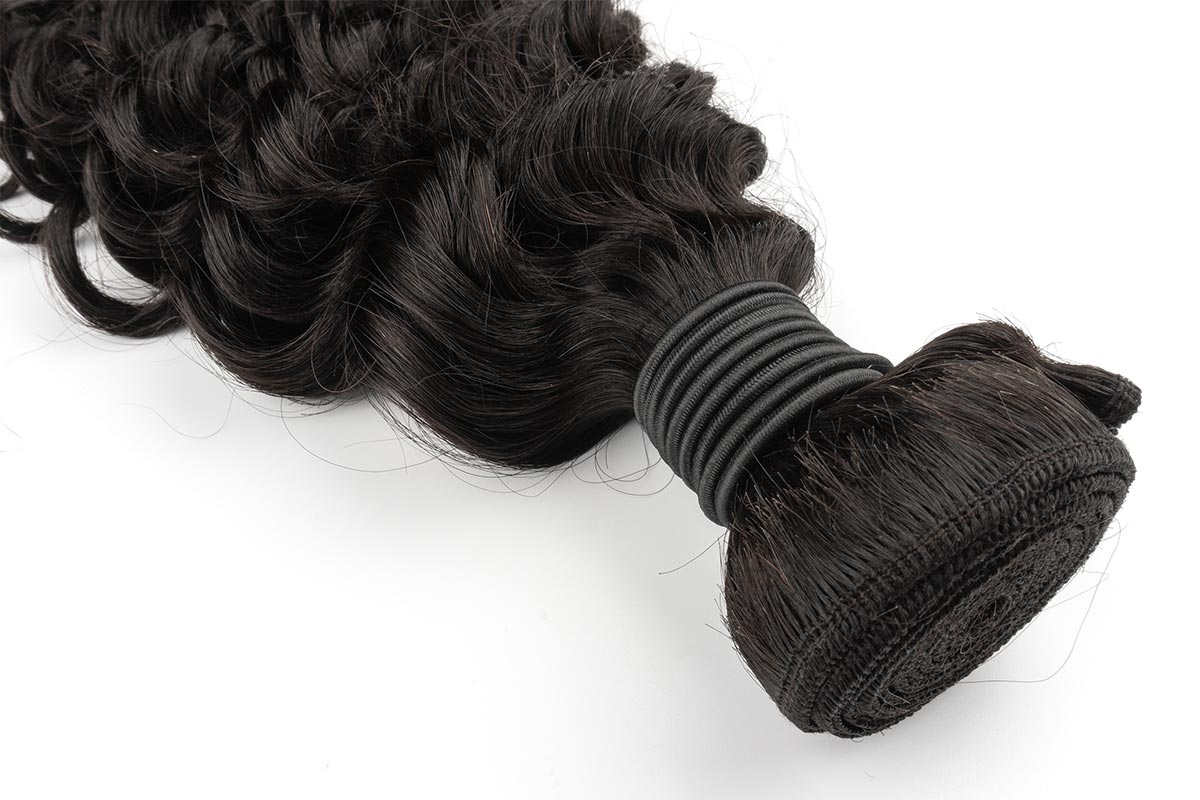 Zoomed-in detail of Black Line French Curly Hair curls.