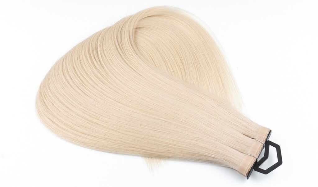 Master the art of product photography for blonde pop-up weft hair extensions.