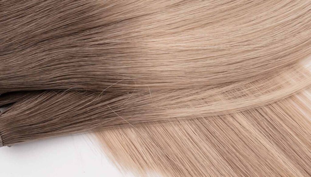 Blonde genius weft with brown root, ideal for hair vendor questions.