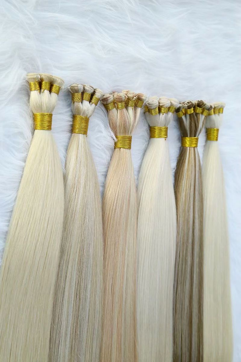 Variation of different blonde hand-tied wefts.