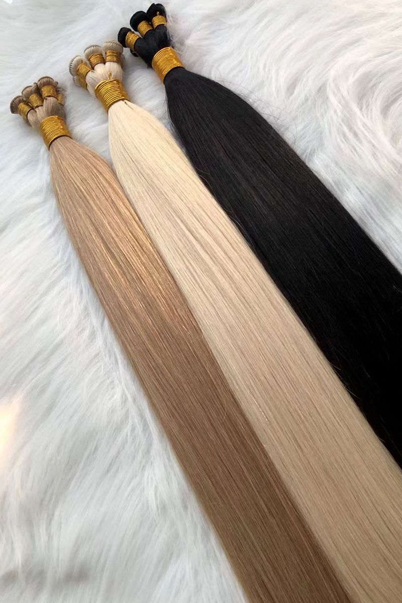 Set of three hand-tied wefts in black, blonde, and light brown.