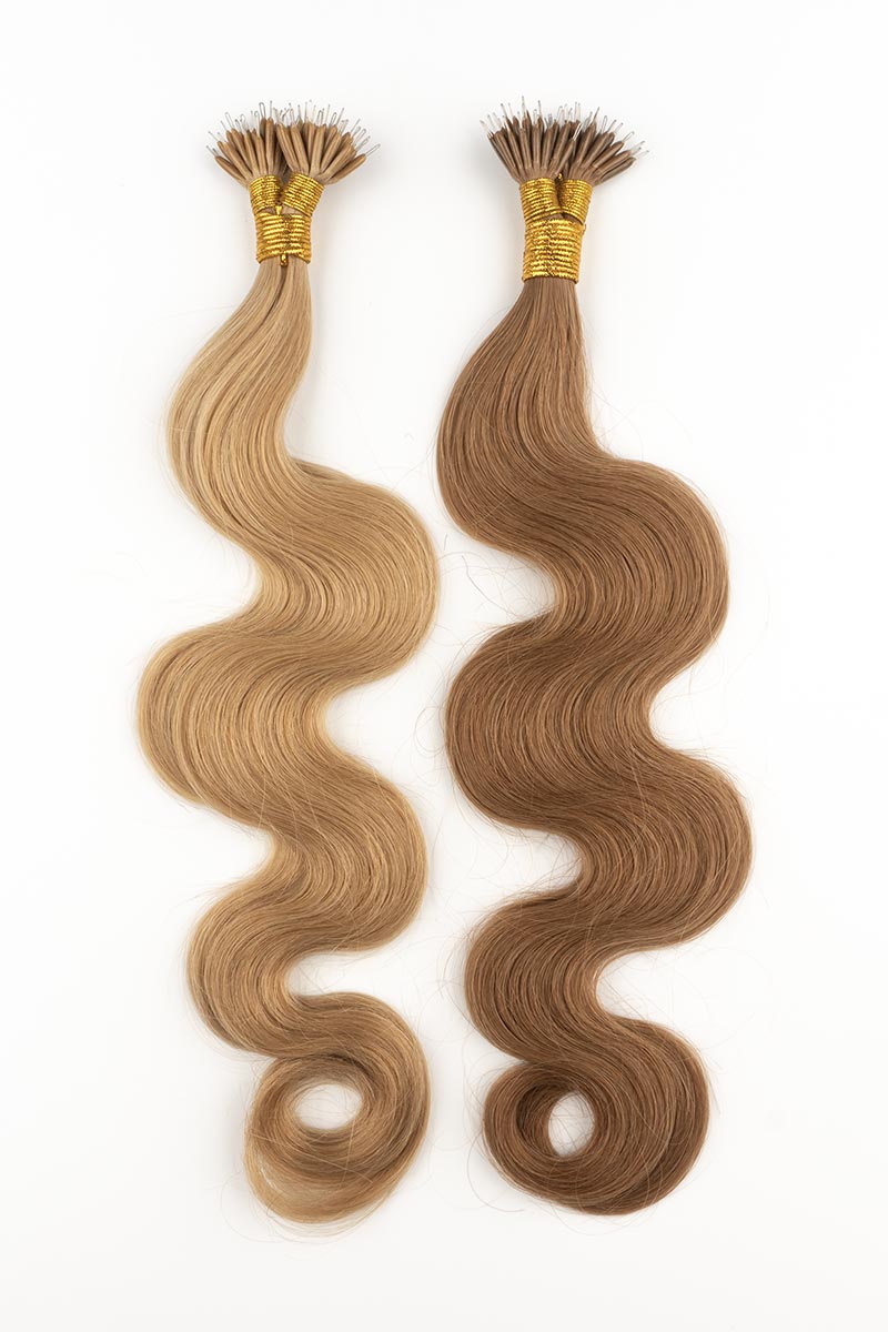 Two body wave nano ring extensions, one light brown and one medium brown.
