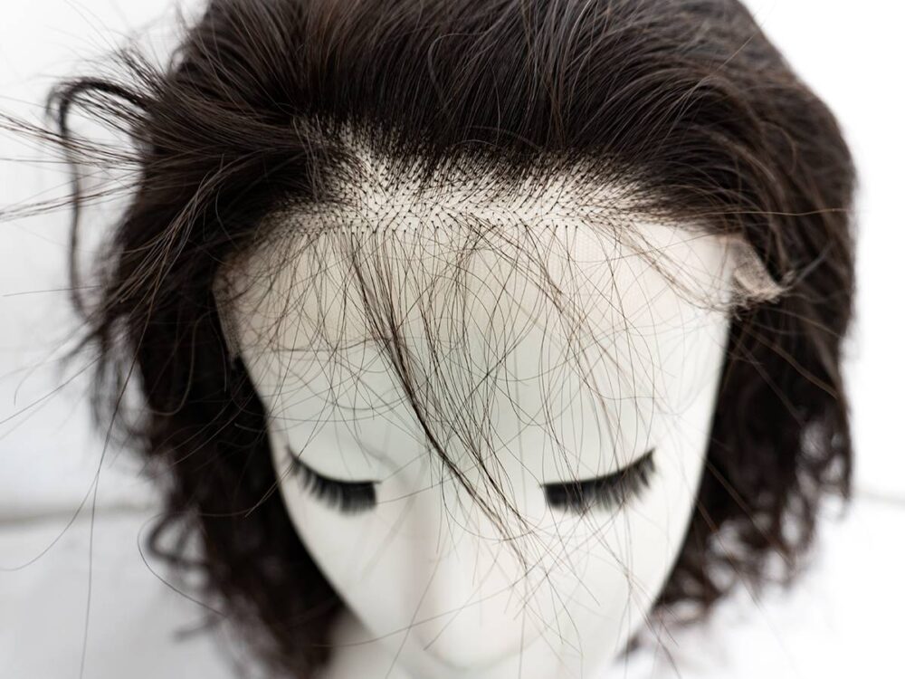 Detailed view of the 5x5 lace closure on a body wave wig