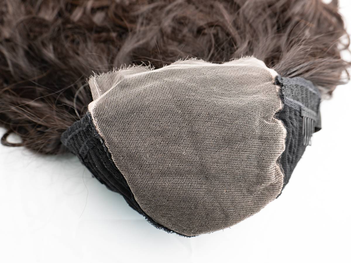 Inner construction of a 5x5 lace closure body wave wig showing cap and lace details