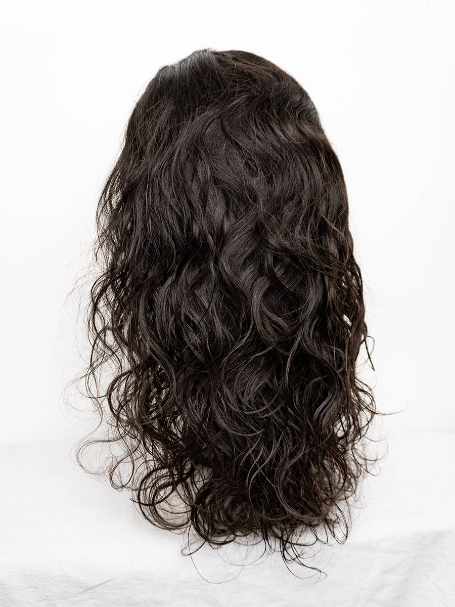 A body wave wig featuring a 7x7 closure and HD lace