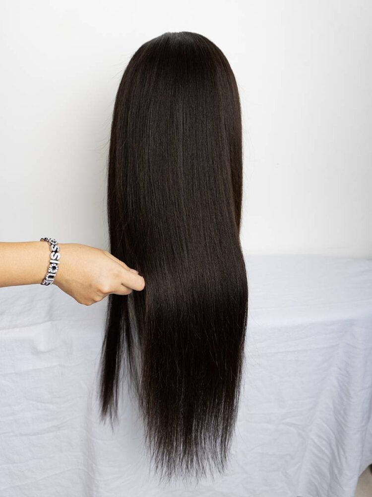 A 4x4 closure straight wig made with Orange Line raw hair