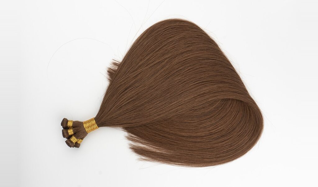 Hand-tied brown wefts showcasing the quality of raw hair