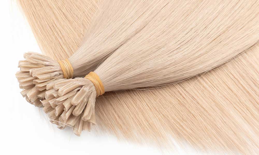 Blonde color 18 U-Tip hair extensions, symbolizing quality hair.