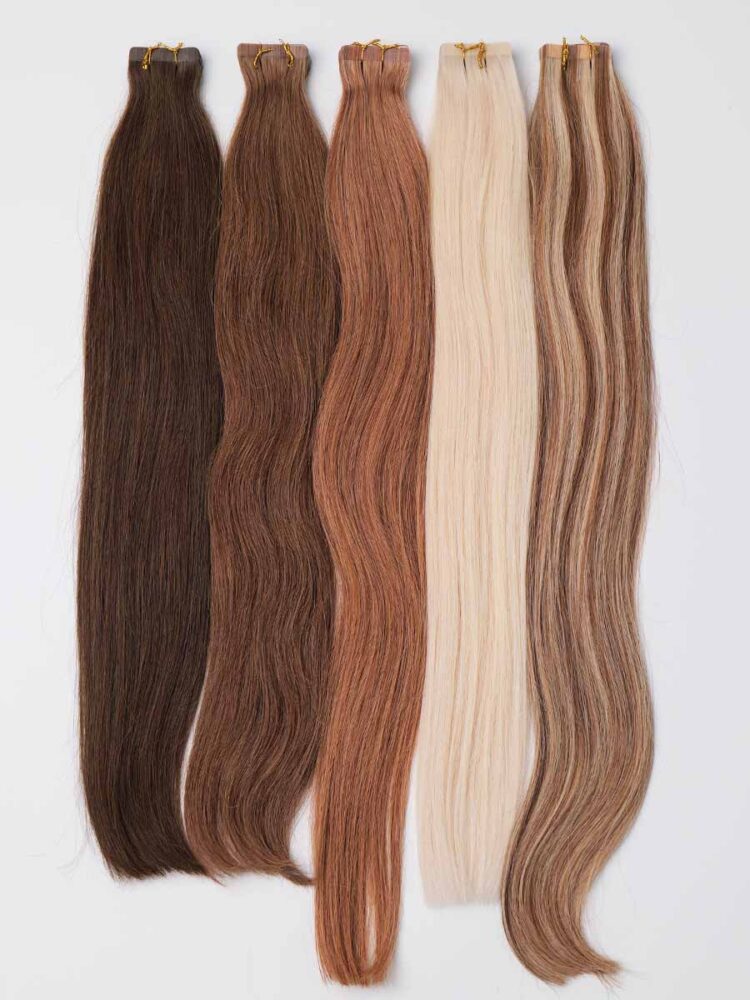 Full view of colored straight tape-in extensions showing entire length from tape tabs to ends.