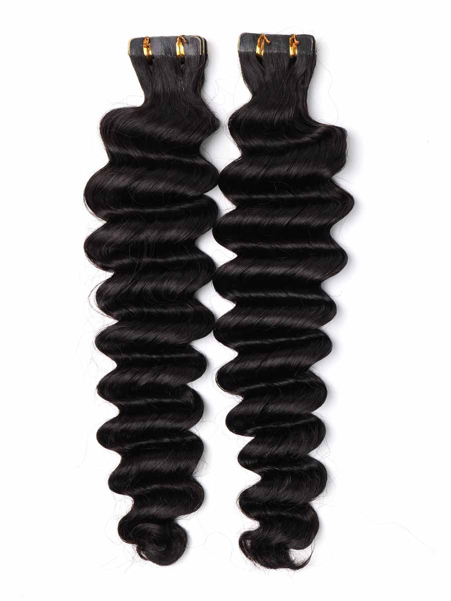 Pair of deep wave tape-in extensions laid on a white background, clearly showing tape tab positioning.