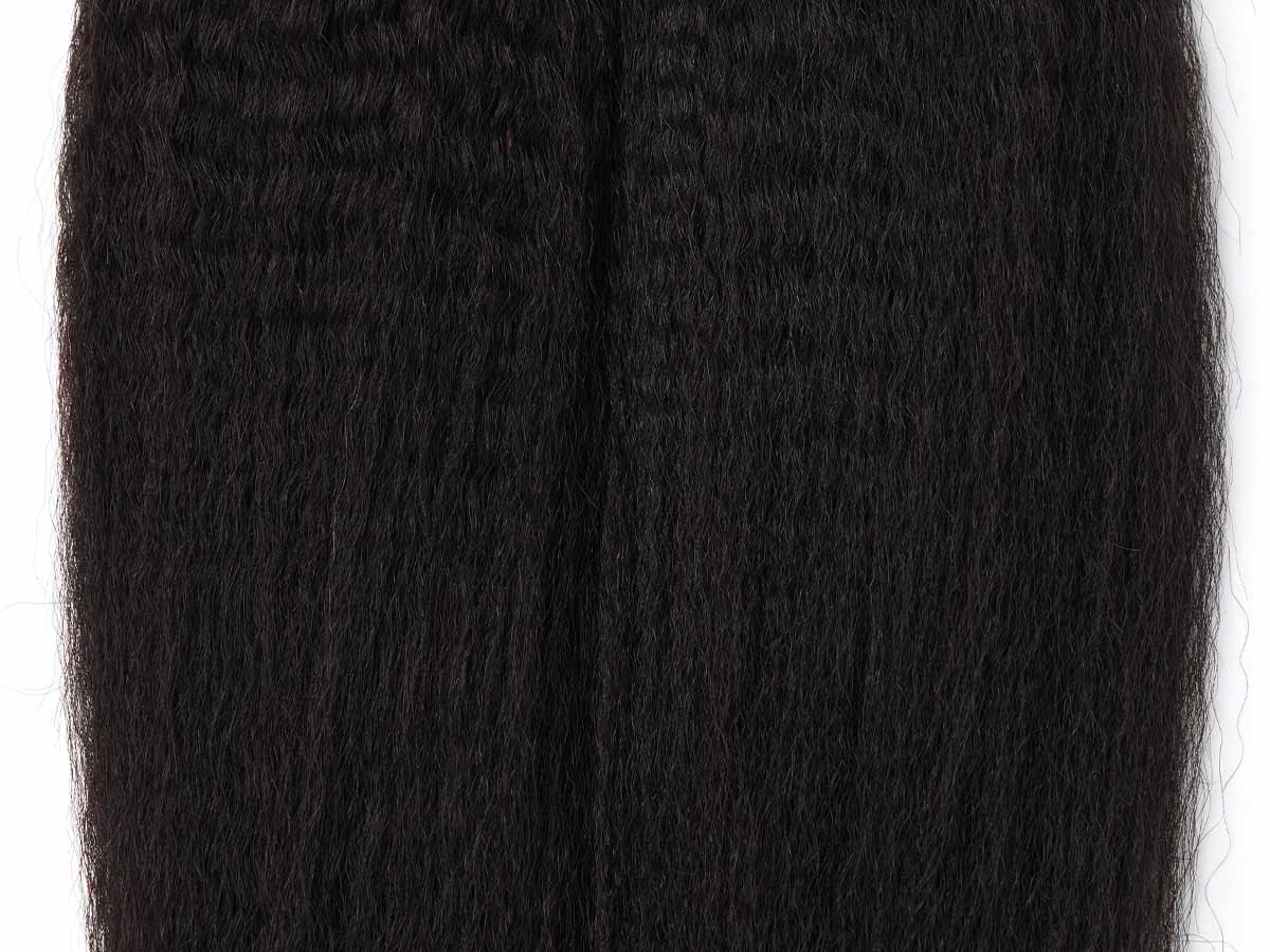 close-up of kinky straight tape-in weaves mid-length to show texture detail