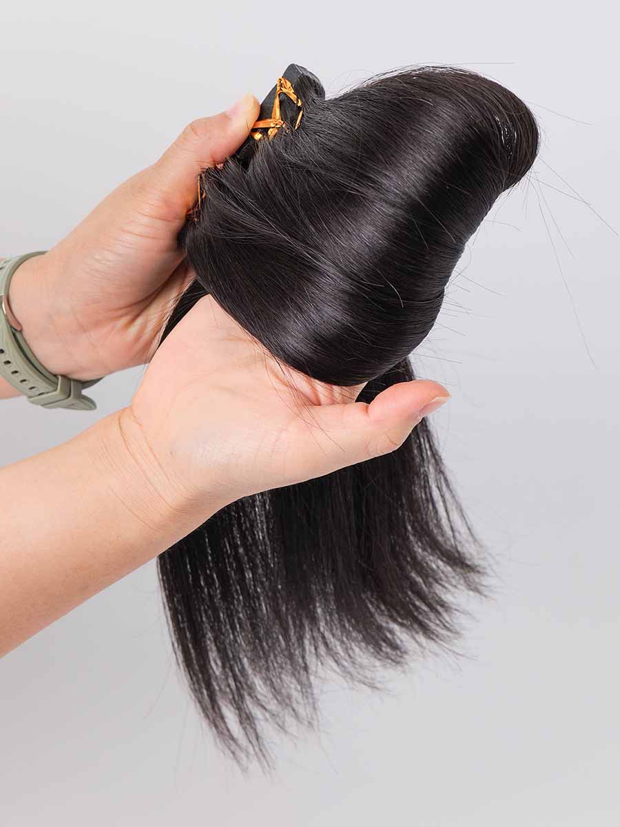 Black Line Straight Tape-In Extensions, 2 pieces, 50g, straight texture on a neutral surface.