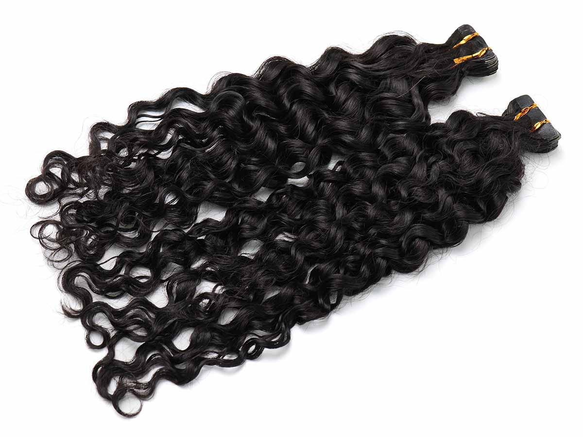 Angled view of water wave tape-in extensions with the ends closest to the camera, showing wave flow.