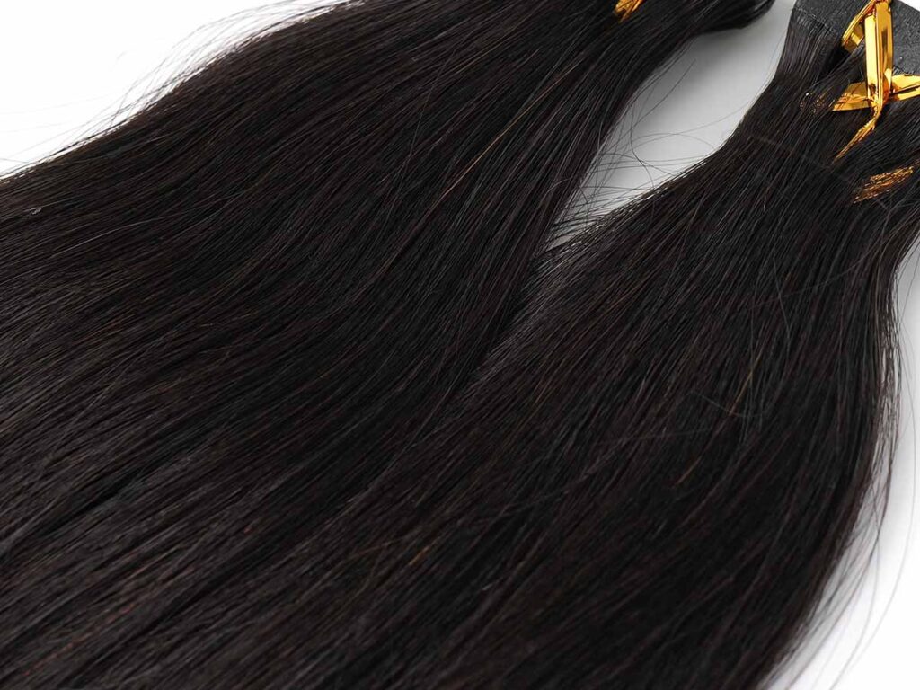 Processed virgin hair showing red strands